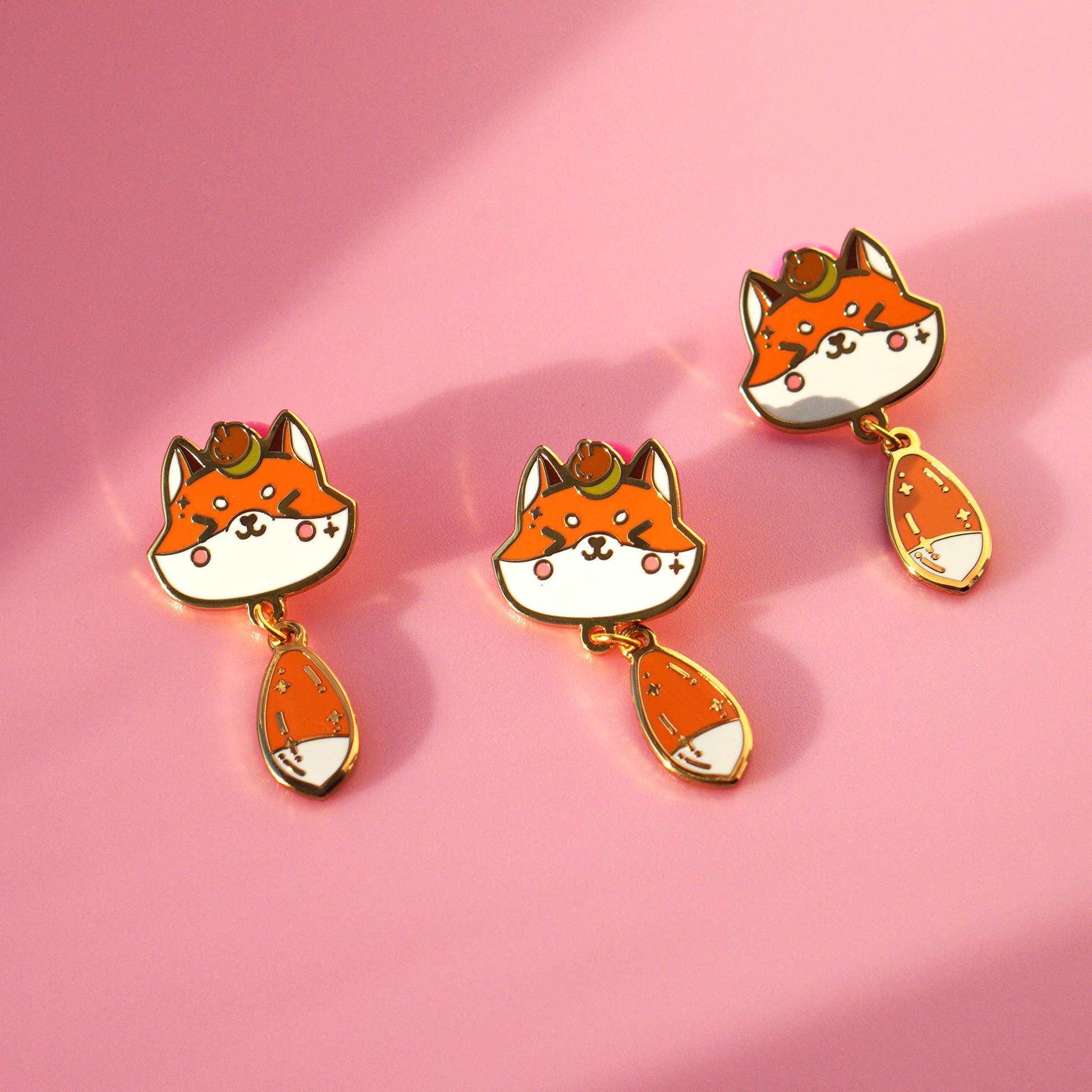 3 Fox enamel pins with a golden edge