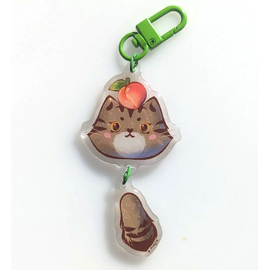 Cat Momo keychain. Double sided. With green clamp. The side shown here is her pretty face.